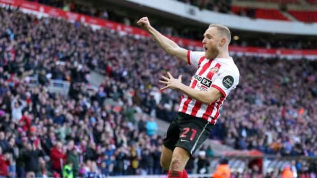 Alex Pritchard celebrates scoring against Preston